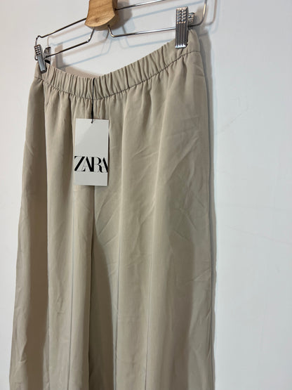 ZARA. Flowy beige wide-legged trousers. TS