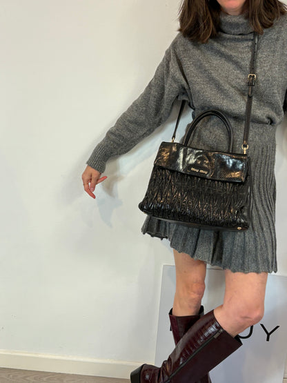 MIU MIU. Bolso matelassé piel negro