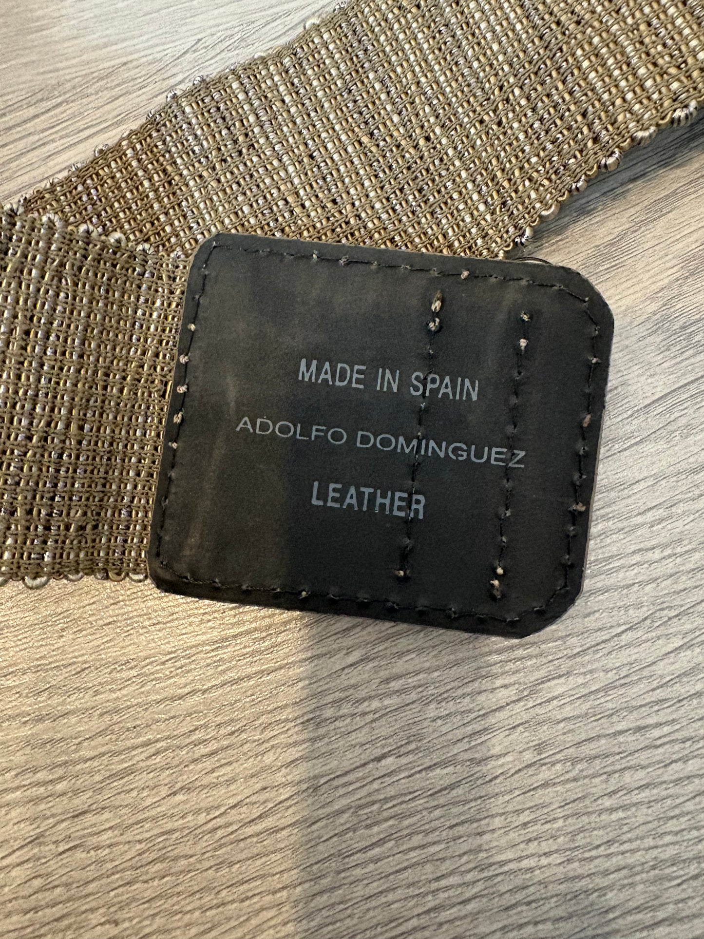 ADOLFO DOMINGUEZ. Cinturón semi elástico con piel