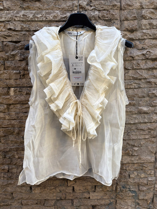 ZARA. Blusa volante crudo