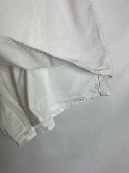 OTHERS. Double-layer white Bermuda shorts. TM