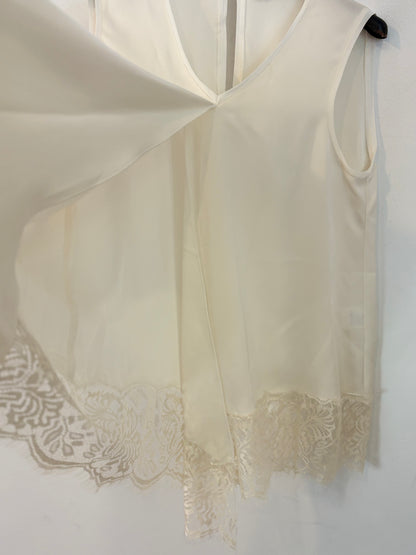 UMO COLLECTION. Top  encaje color crudo abertura