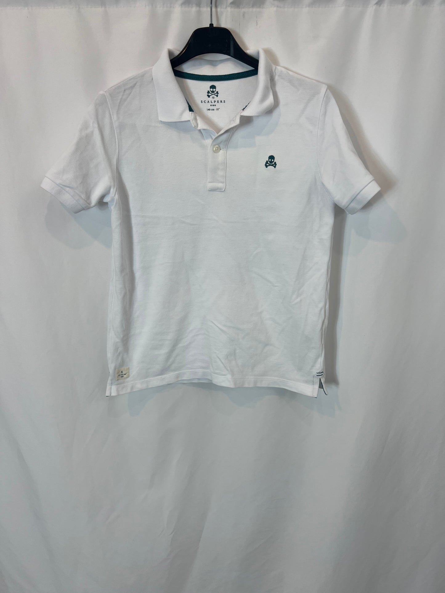 SCALPERS. White polo shirt with green logo. 10 years old.