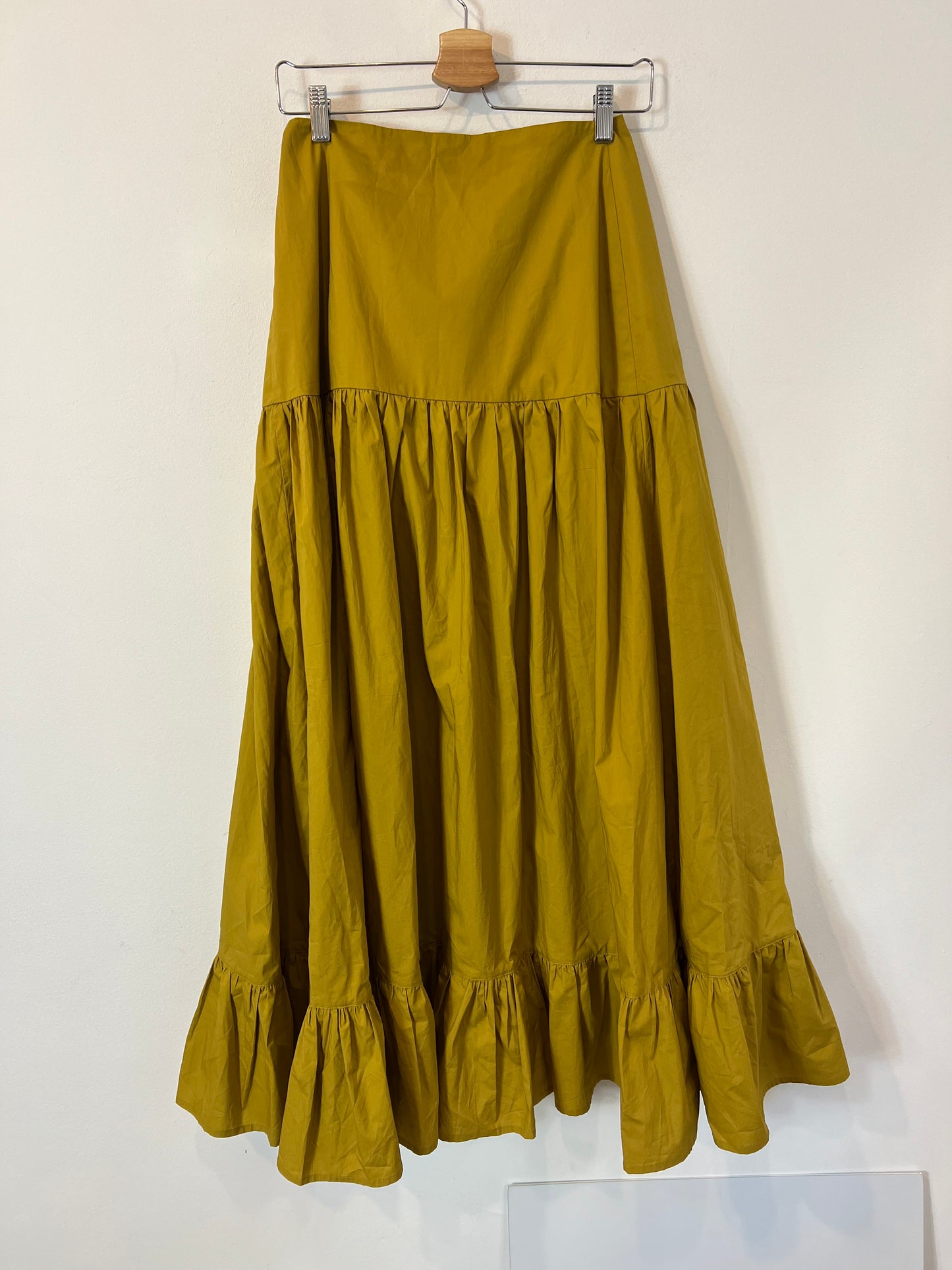 IS COMING. Falda larga mostaza