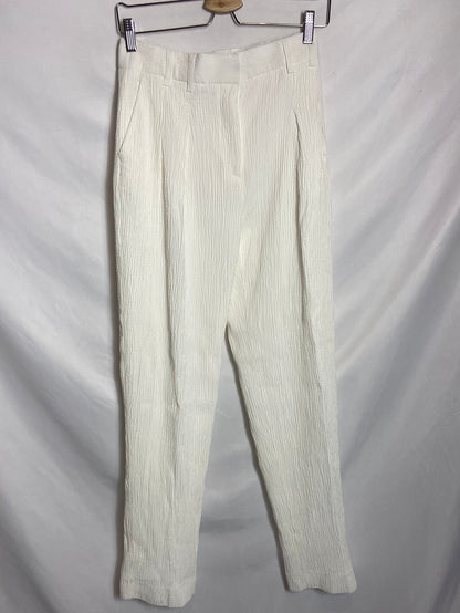 VICTORIA BECKHAM. Total look blanco textura T.36