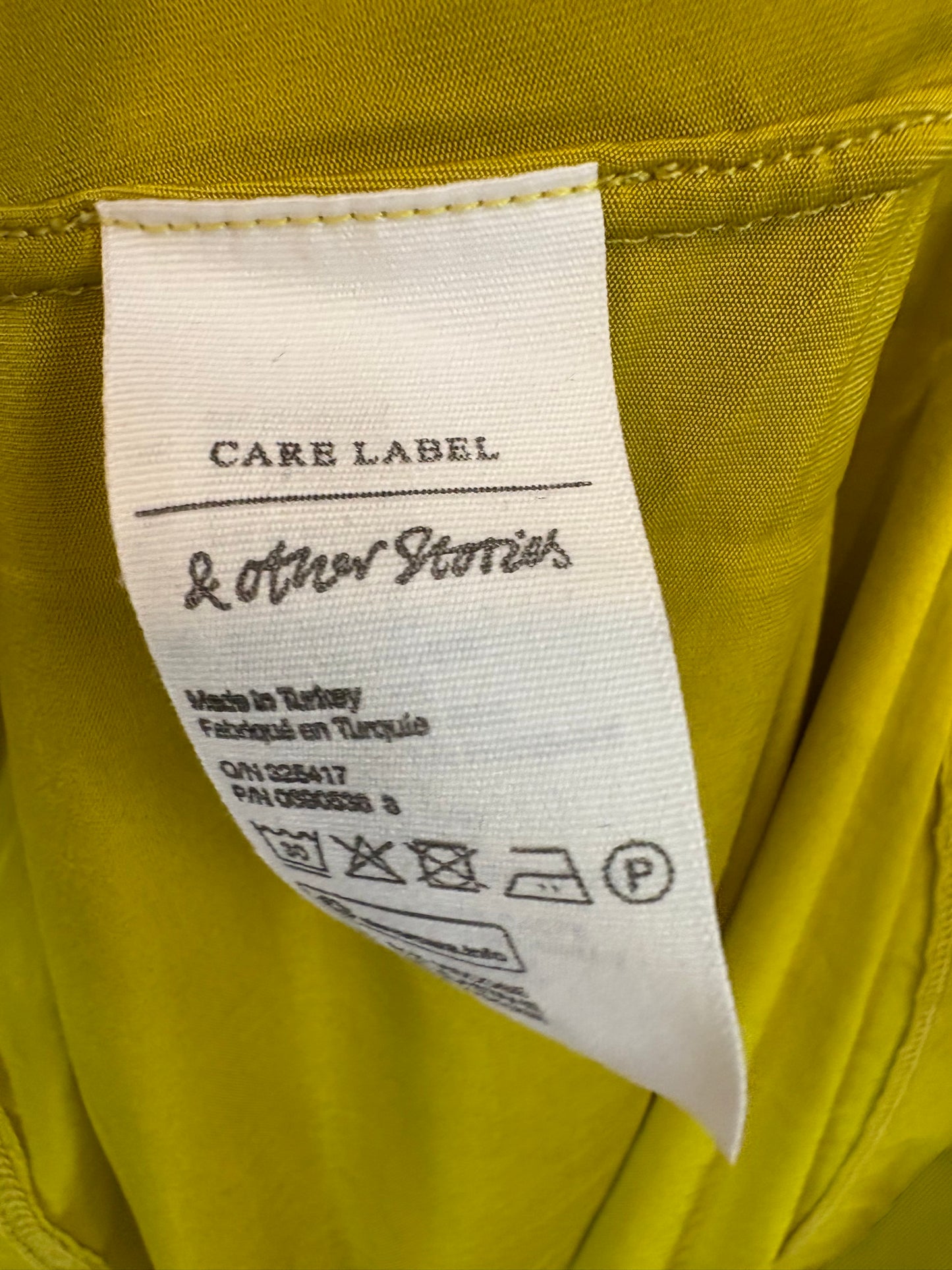 & OTHER STORIES. Top verde licra T.36