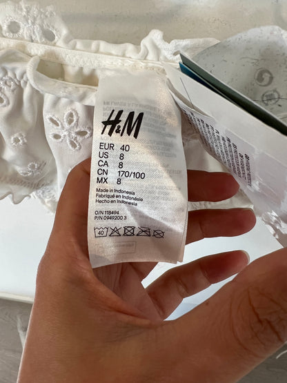 H&M. Bikini blanco troquelado. T 38/40