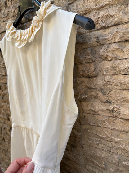 COAST WEBER AHAUS. Top color crudo detalle cuello