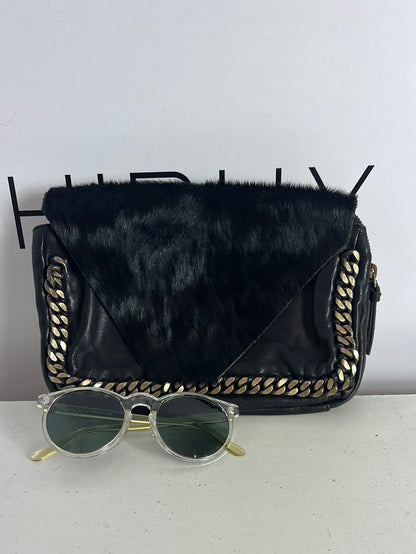 INTROPIA. Bolso de mano piel doble textura