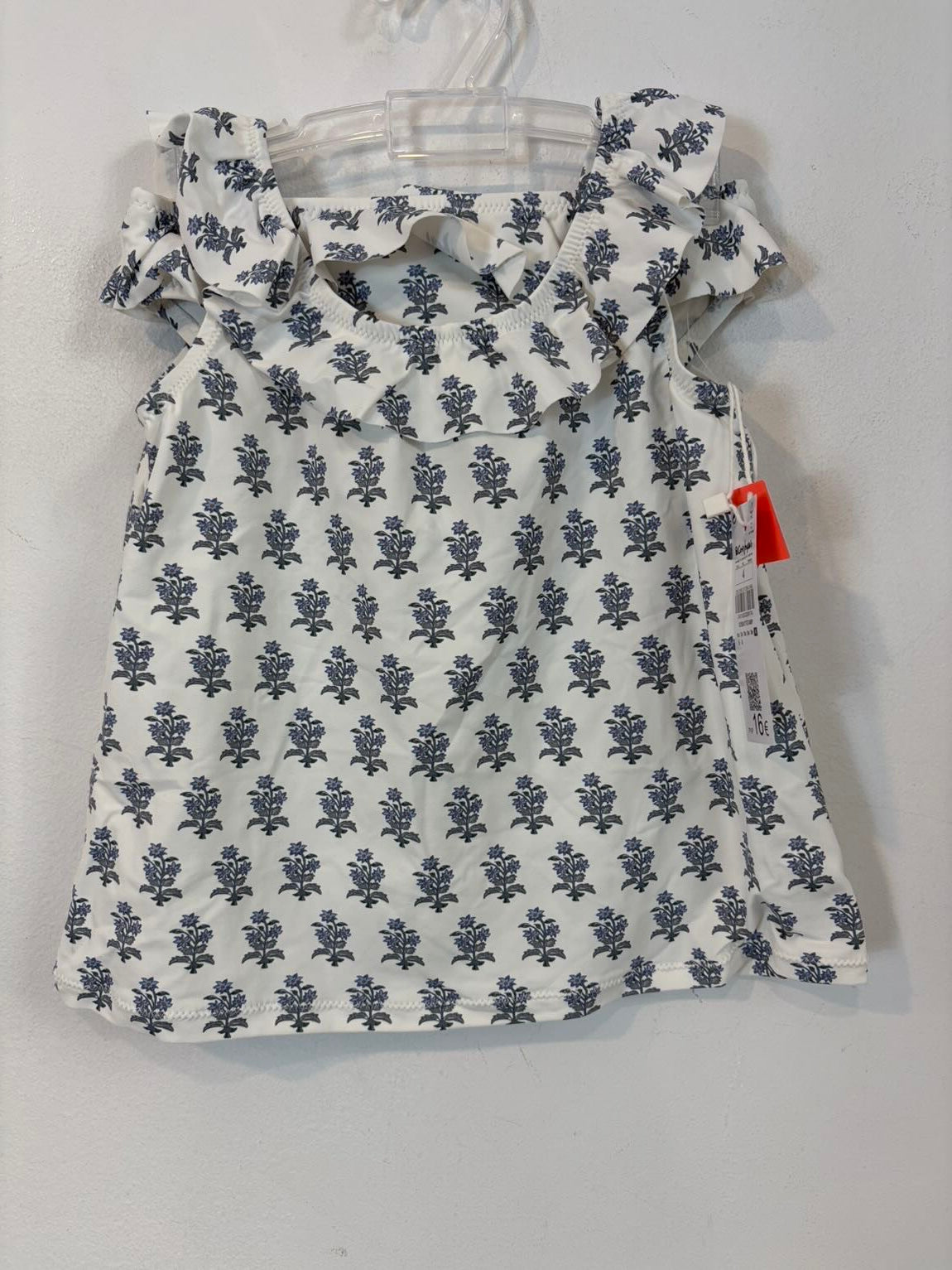 Conjunto baño dos piezas niña  fondo blanco. T 4 años