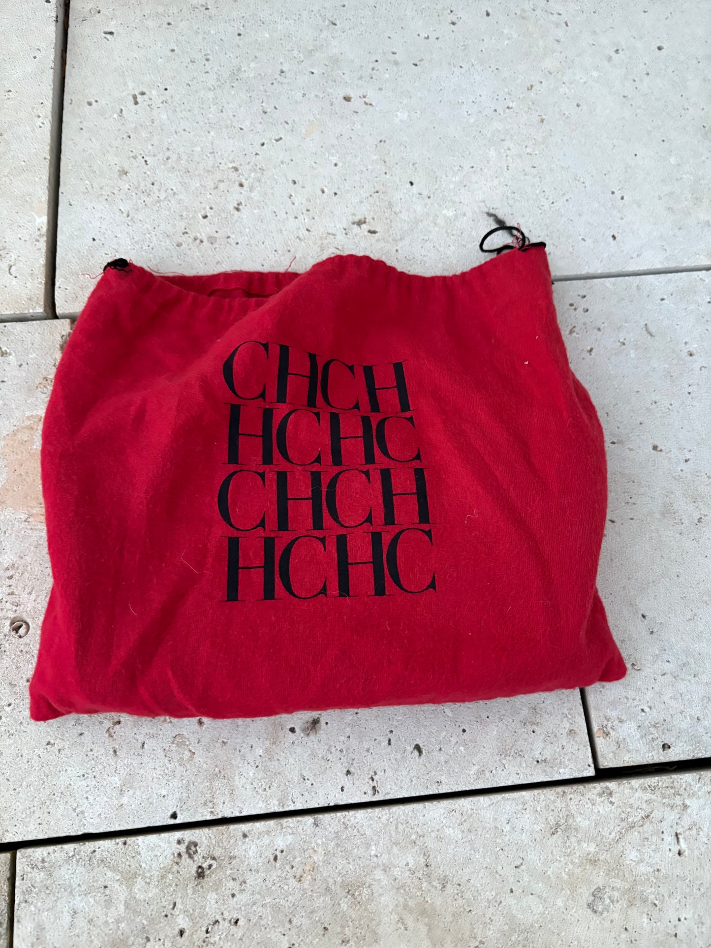 CAROLINA HERRERA. Bolso clutch marrón piel