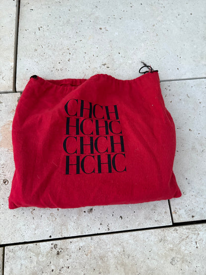 CAROLINA HERRERA. Bolso clutch marrón piel