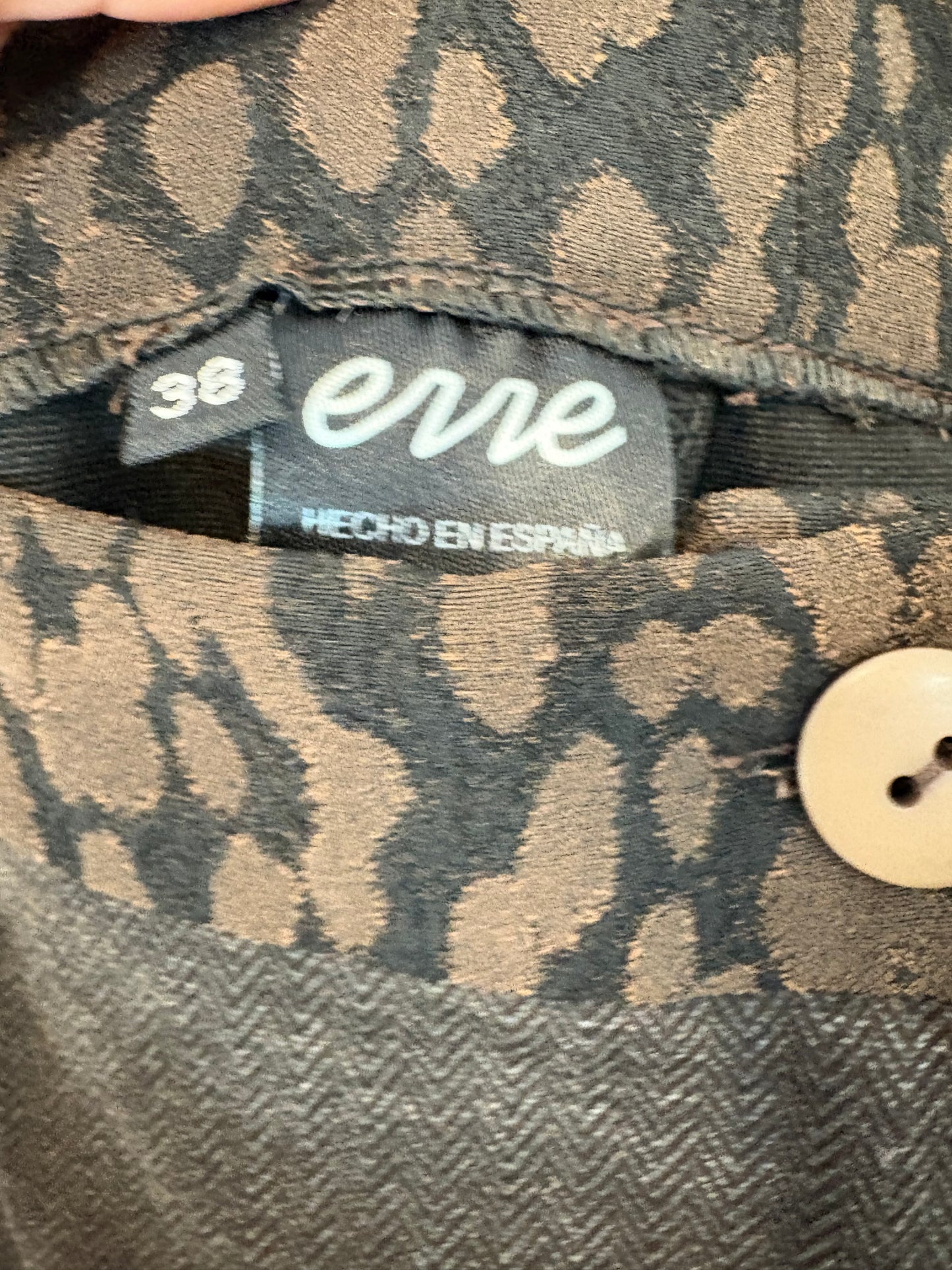 ERRE. Pantalón marrón espiga animal print