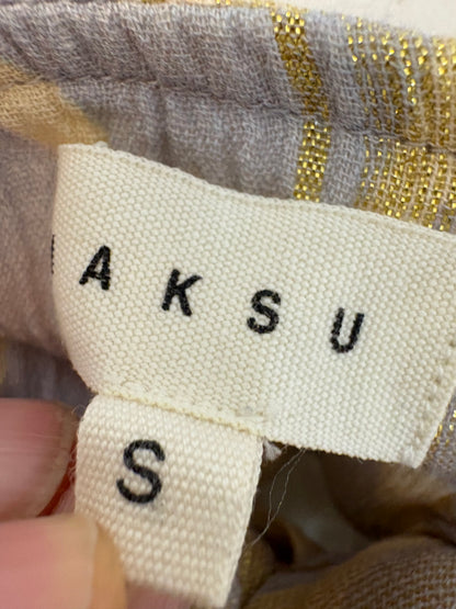 MAKSU. Falda midi detalles dorados