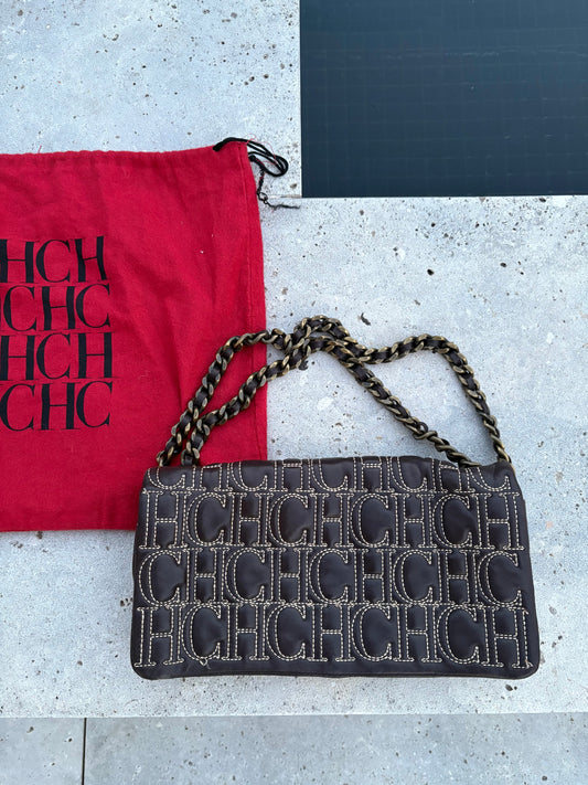 CAROLINA HERRERA. Bolso clutch marrón piel