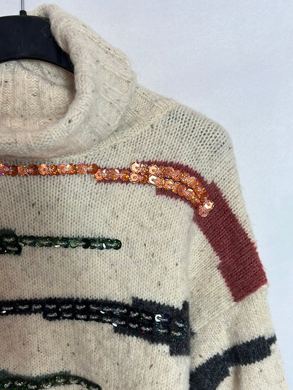 FÓRMULA JOVEN. Jersey beige jaspeado detalles. T 38