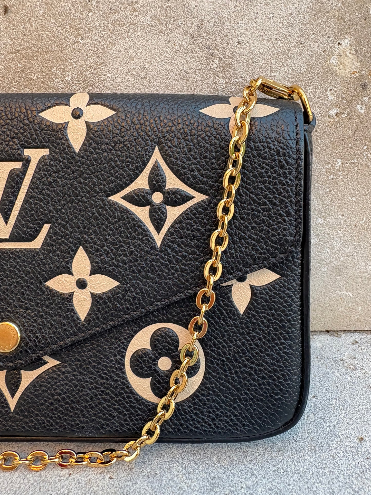 LOUIS VUITTON. Cartera de mano Félicie