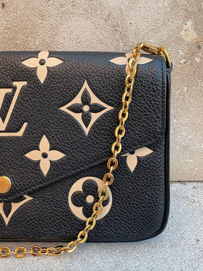 LOUIS VUITTON. Cartera de mano Félicie