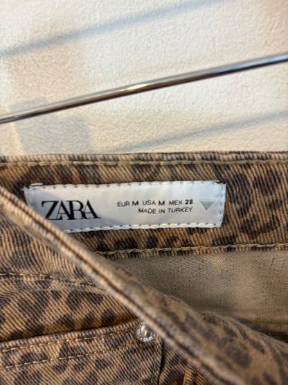 ZARA. Falda denim animal print abotonada