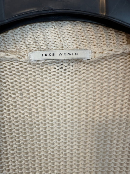 IKKS. Chaqueta calada beige flecos