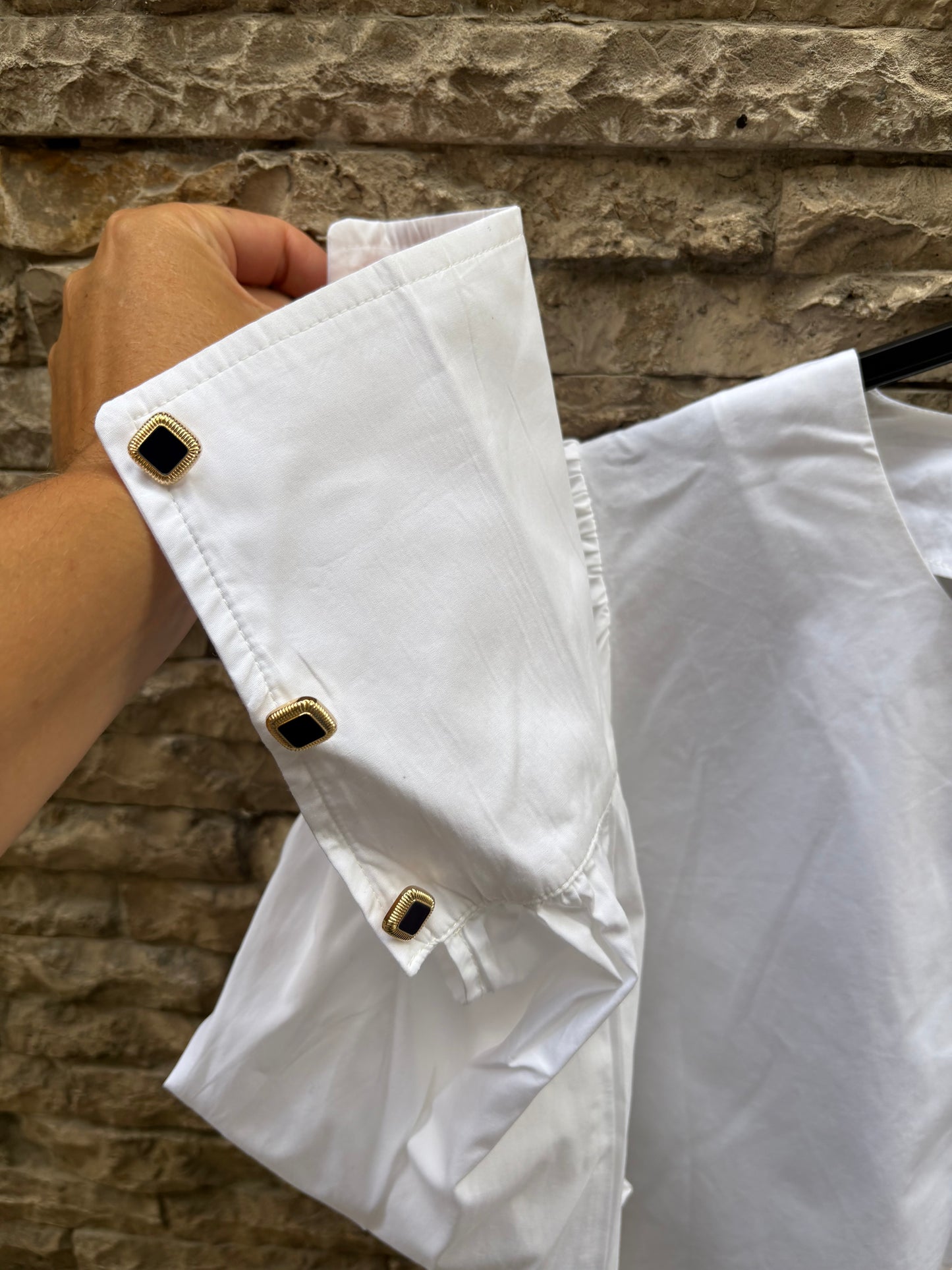 PARIS 64. White blouse with diamond buttons Ts