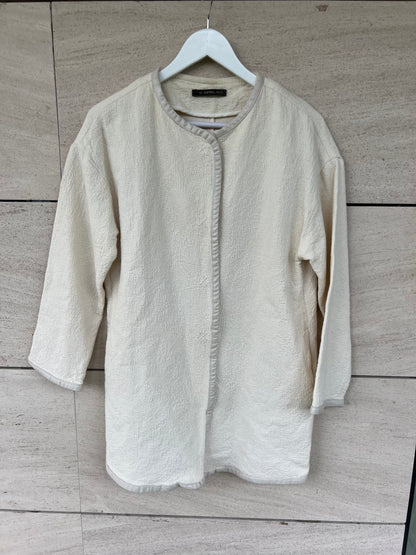 WHITE. White textured Tm jacket