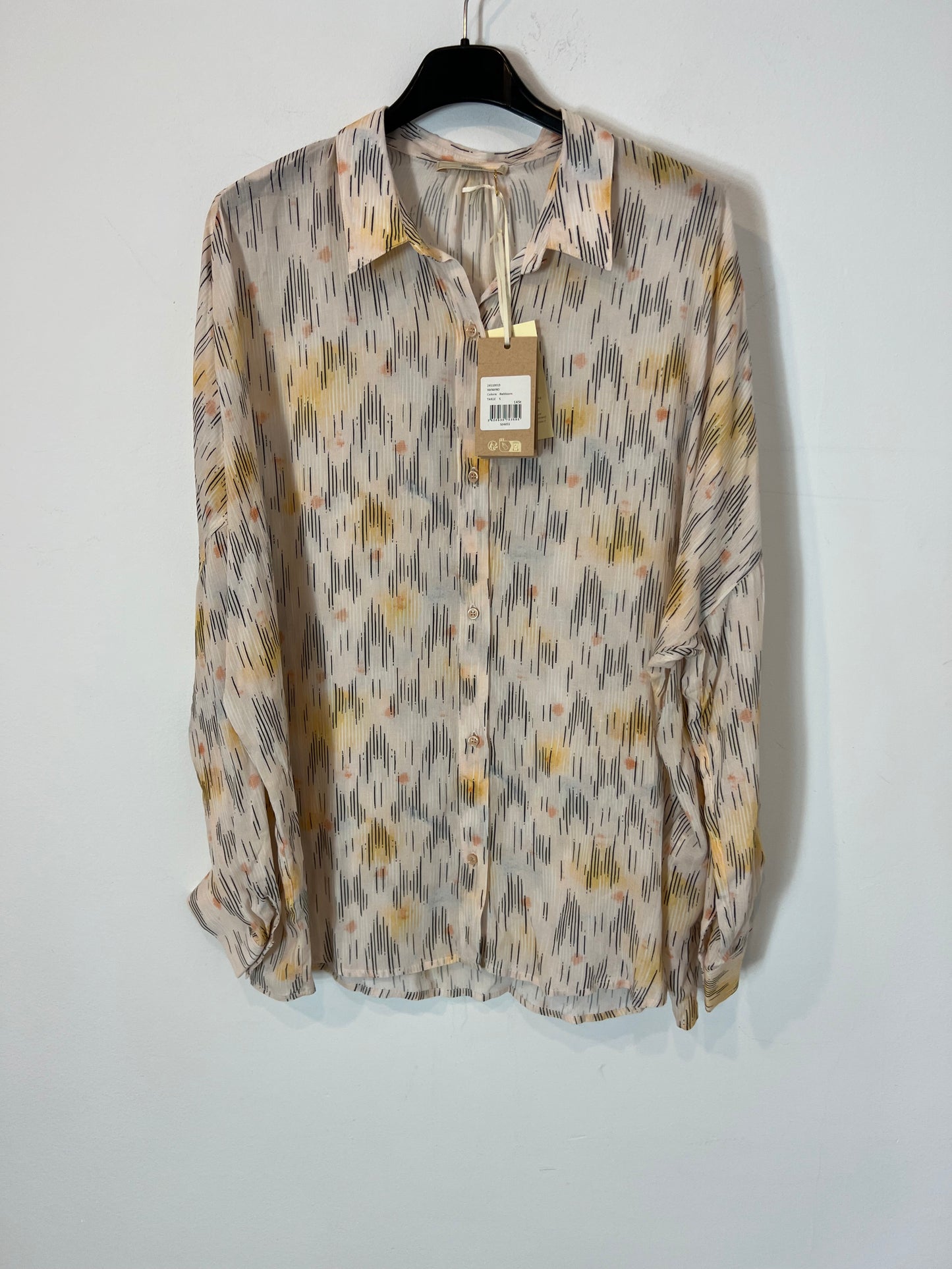 SESSÚN. Total look beige estampado T.s