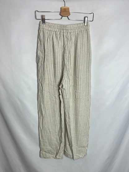 ZARA. Pantalón textura fluido rayas. T XS