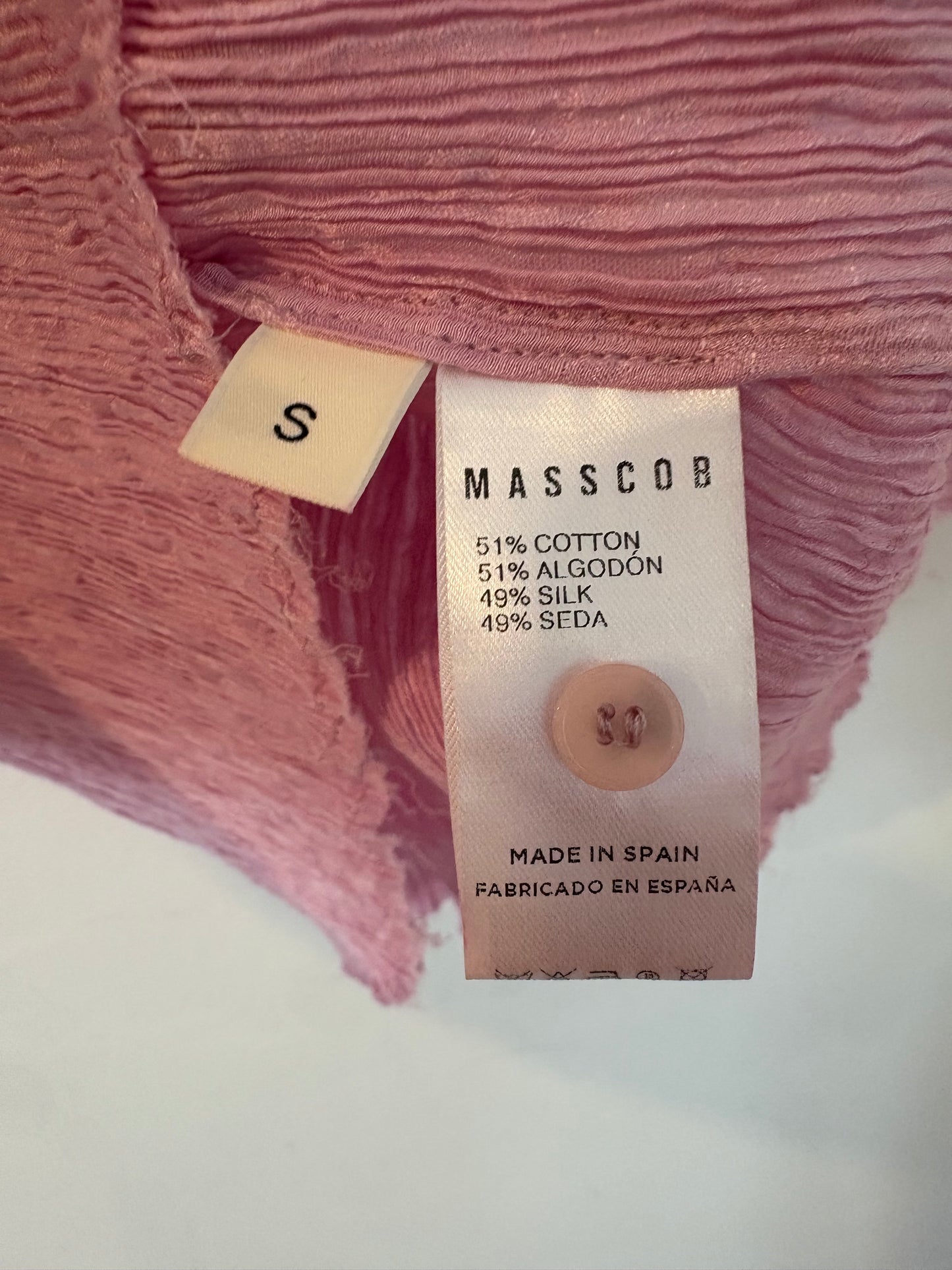 MASSCOB. Top rosa claro textura