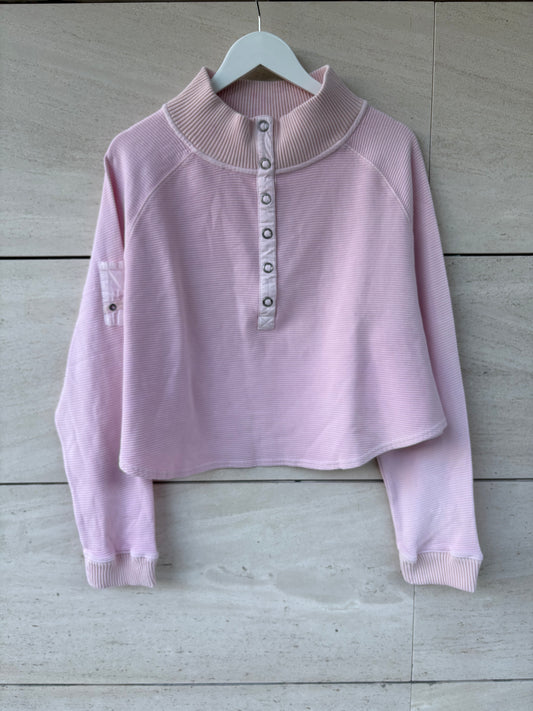 FREE PEOPLE MOVEMENT. Sudadera rosa claro textura
