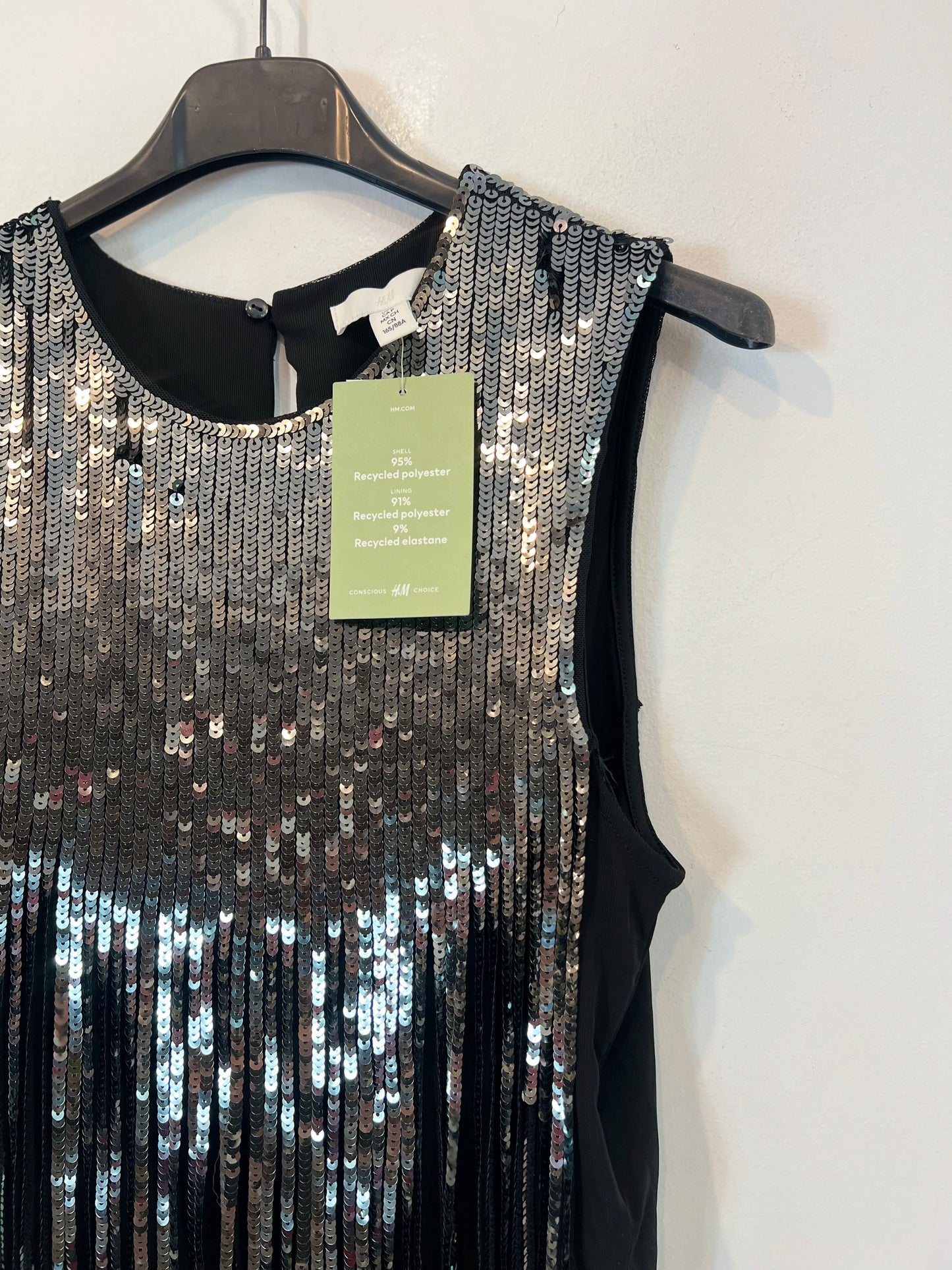 H&M. Top lentejuelas flecos T.s