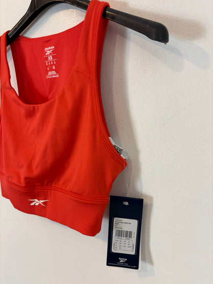 REEBOK. Top deportivo rojo. T XS