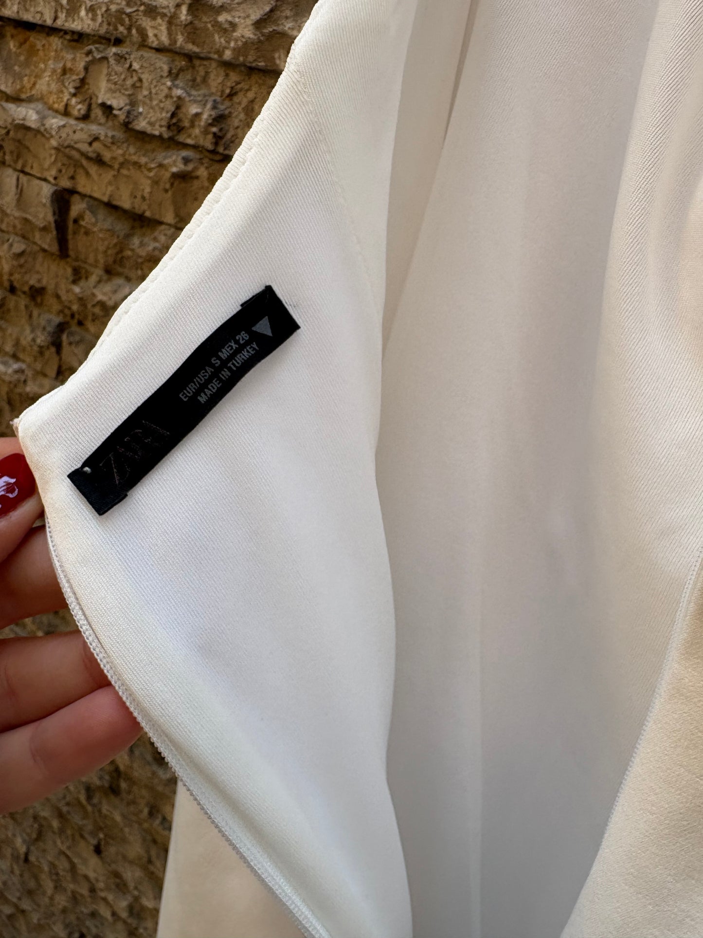 ZARA. Mono largo blanco al cuello