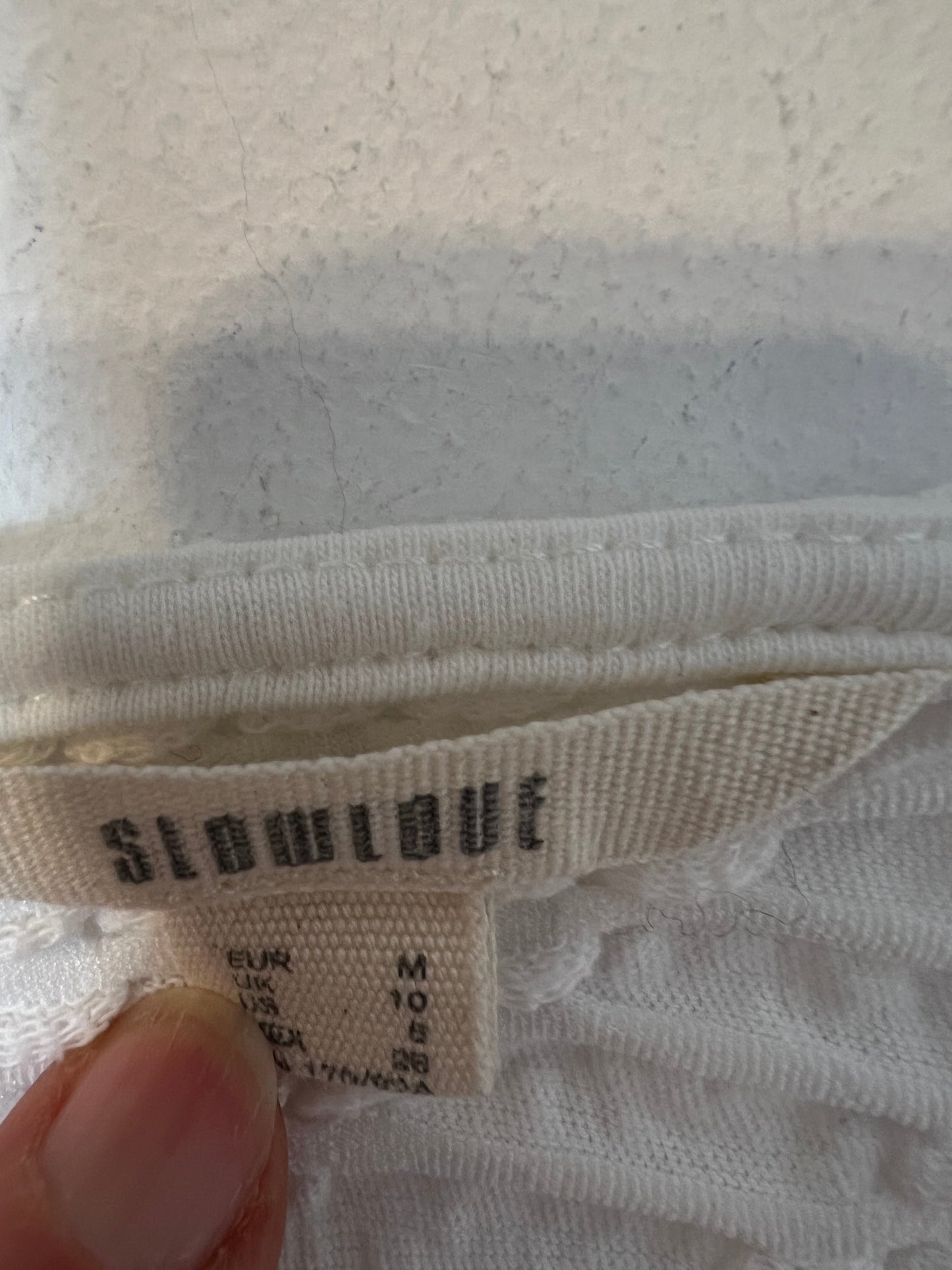 SLOWLOVE. White textured top. TM