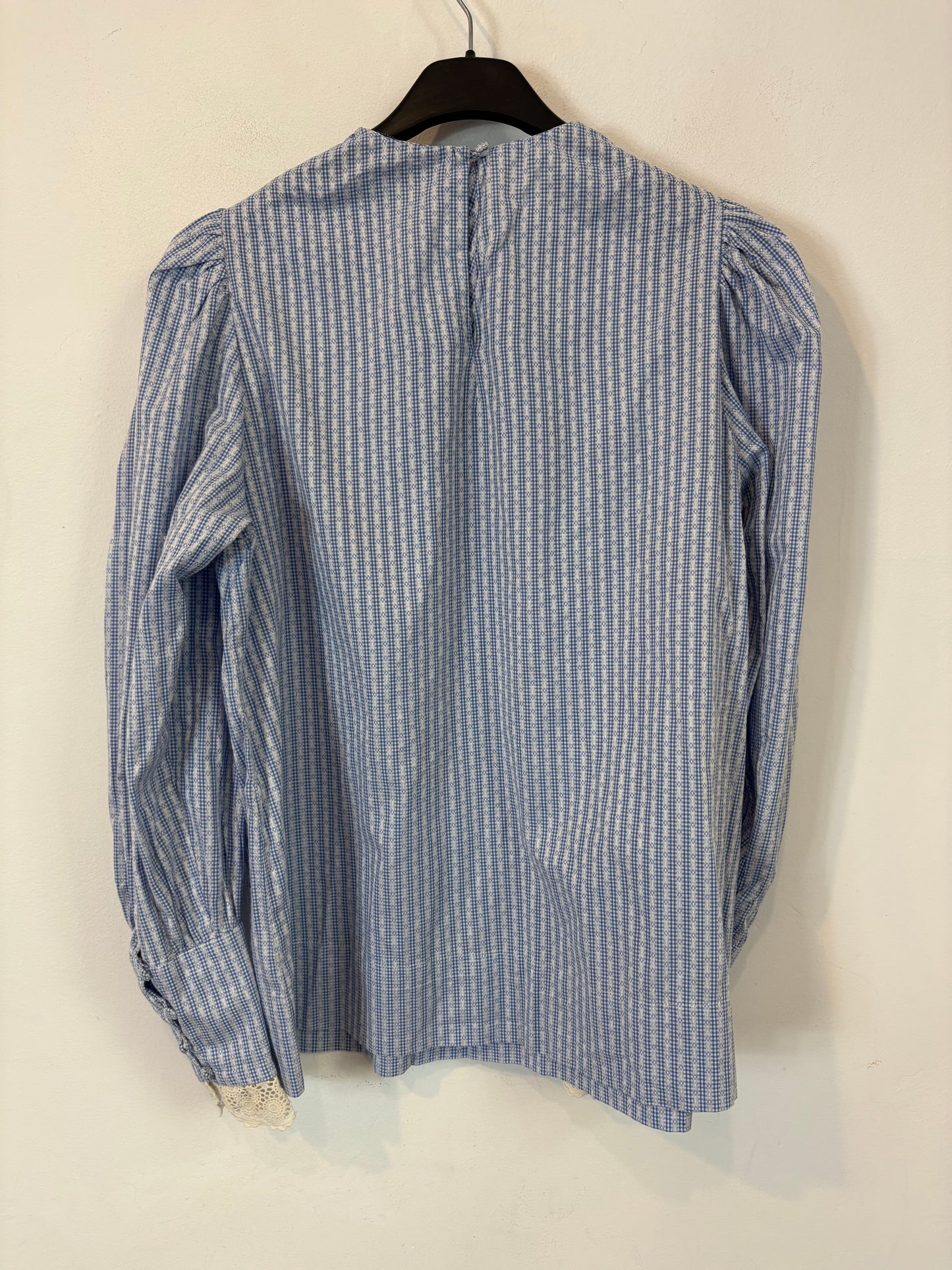 ANDION. Blusa azul detalle cuello