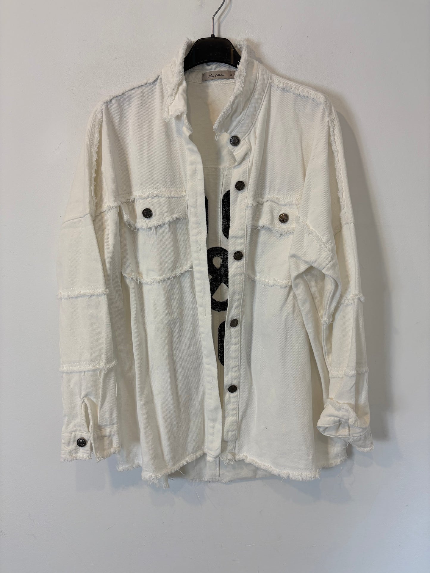 OTRAS. Cazadora blanca detalle espalda T S/M