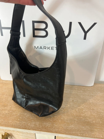 LEFTIES. Black faux leather bag