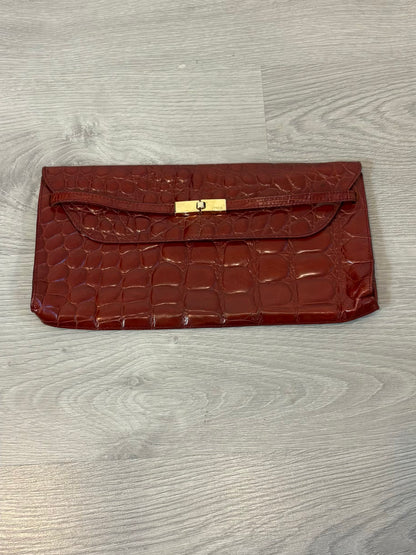FURLA. Cartera de mano piel troquelada