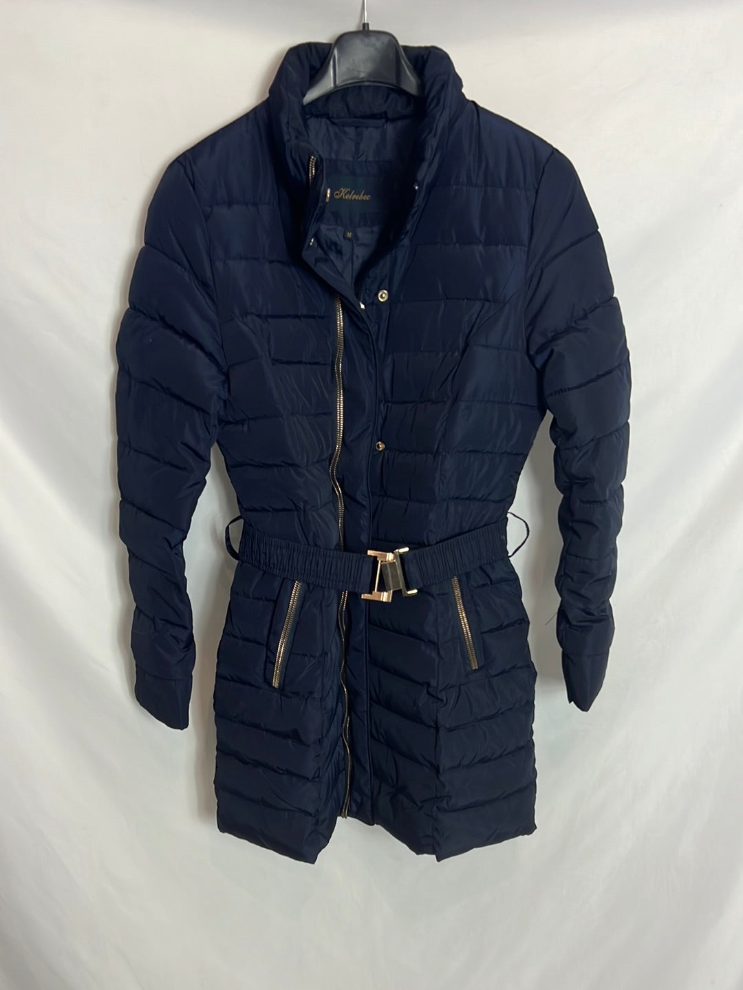 KELREBEC. Plumas azul detalle cremallera. T M