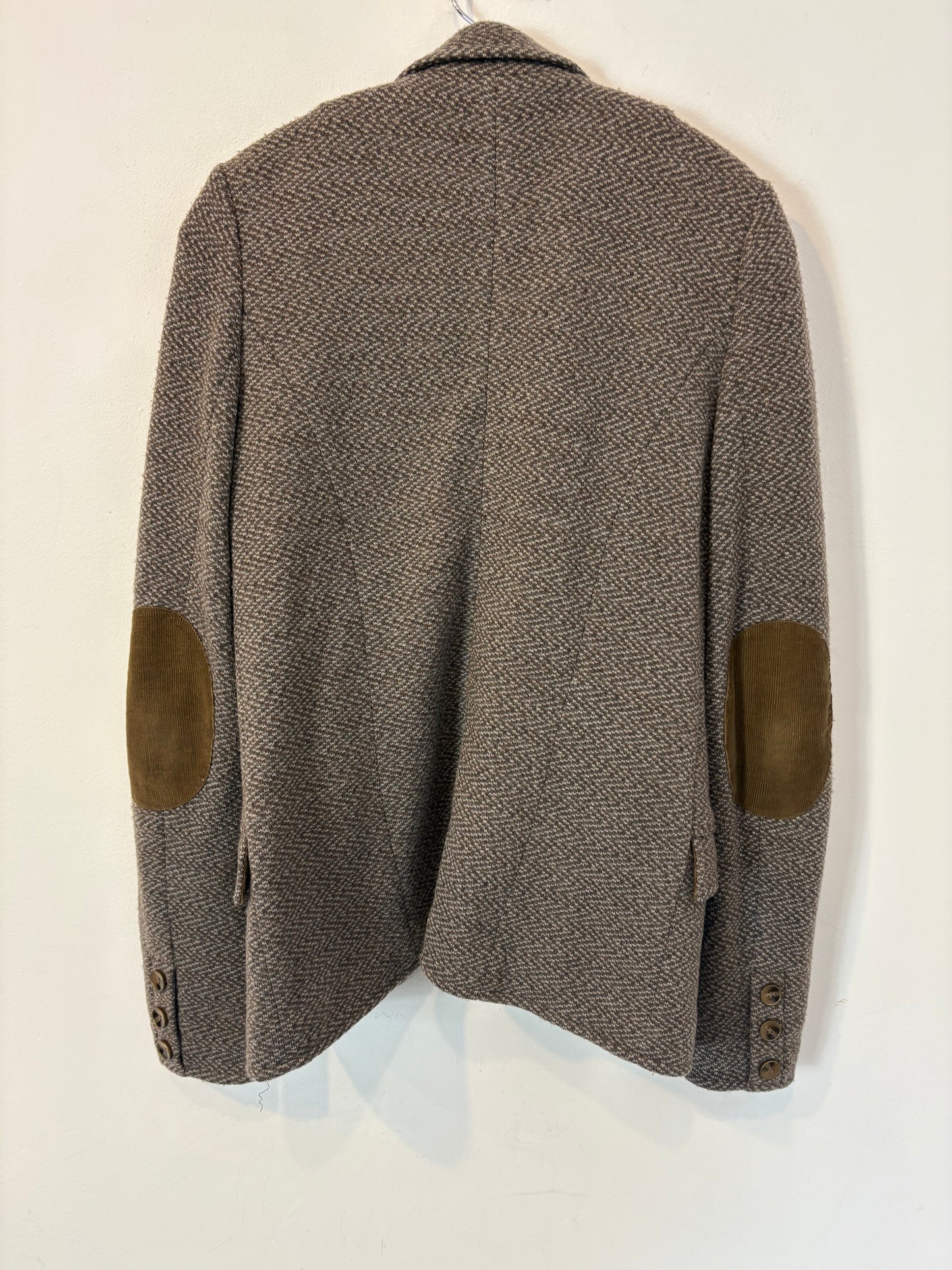 OTRAS. Blazer jaspeada textura