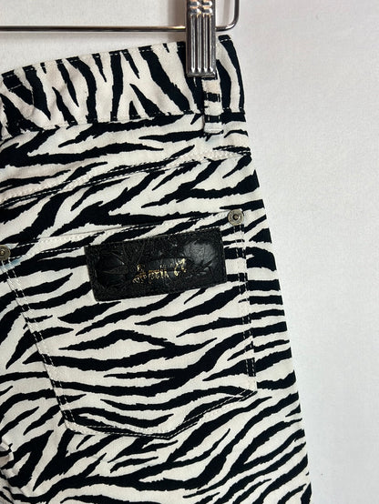 APRIL 77. Denim pitillo estampado cebra . T 36