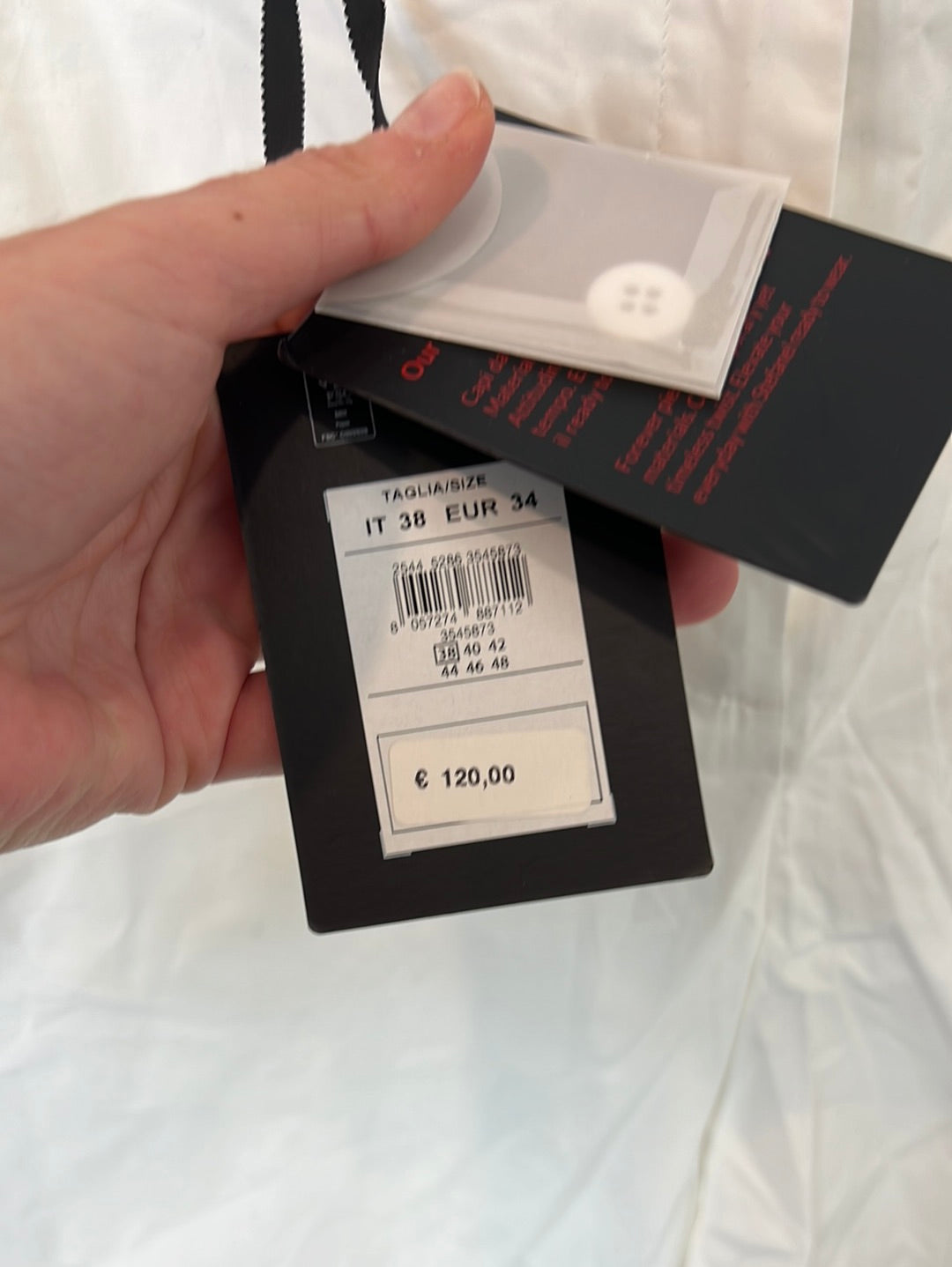 STEFANEL. White wide-leg trousers, size 34