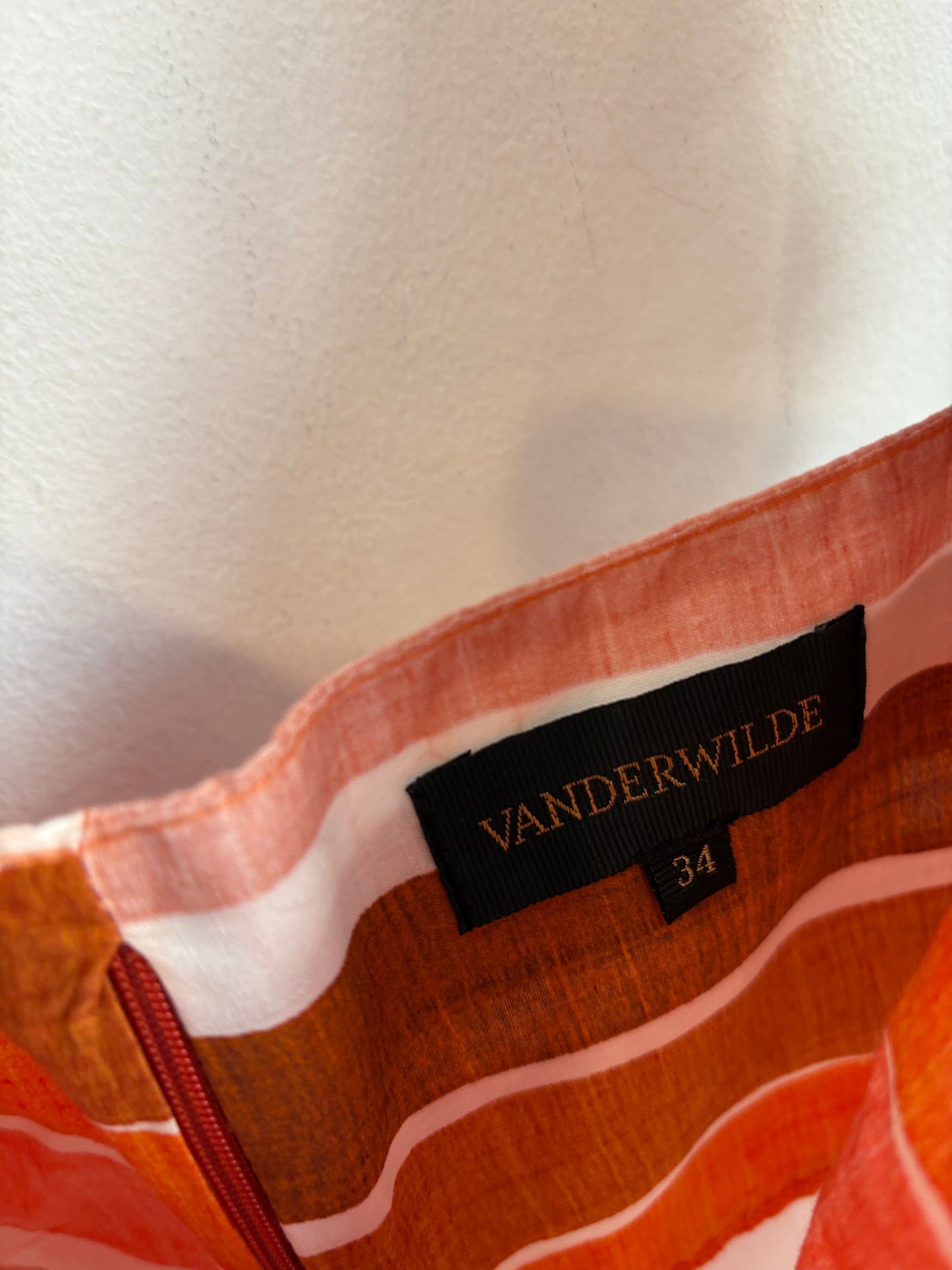 VANDERWILDE. Conjunto top y falda flecos