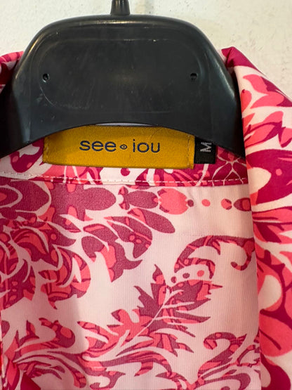 SEE IOU Juan Avellaneda. Vestido corto cruzado estampado rosa