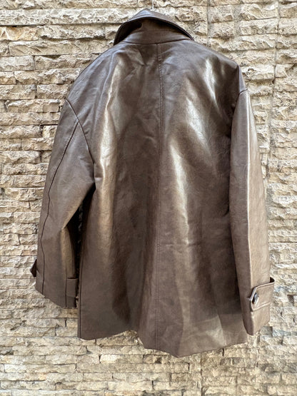 SFERA. Abrigo marrón efecto piel