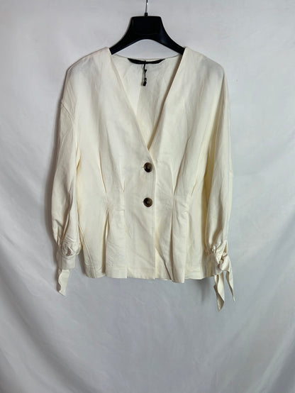 ZARA. Beige blouse with bow and T-sleeves