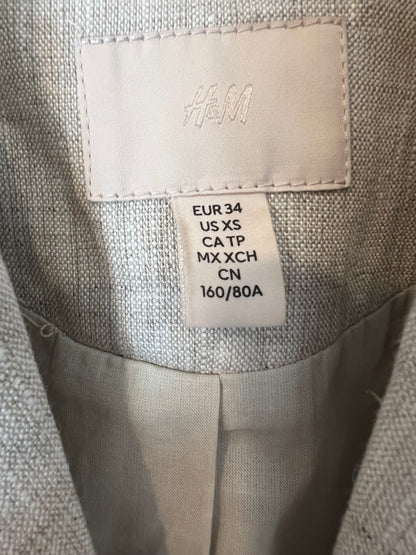 H&M. Chaleco lino bolsillos. T XS