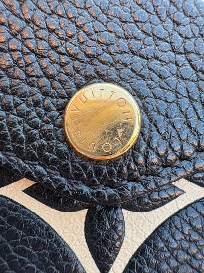 LOUIS VUITTON. Cartera de mano Félicie