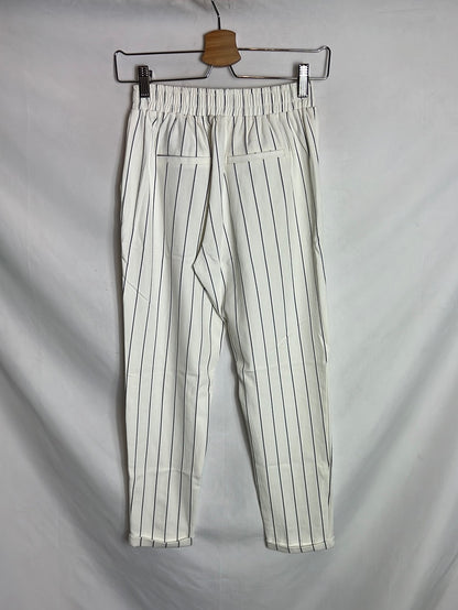 BERSHKA. White striped flowing trousers. TS