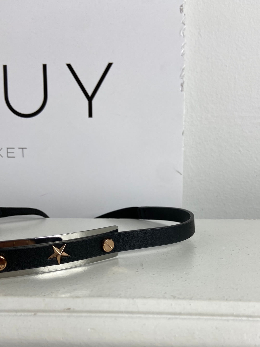 H&M. Cinturón elástico estrellas TU